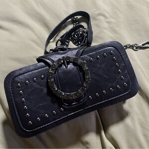 Small multi compartment clutch with attachable chain
